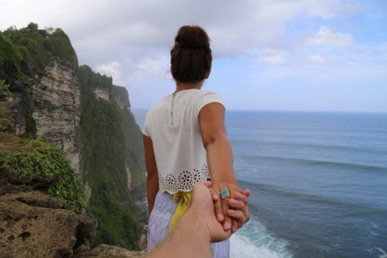 Photo of couple on cliff